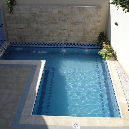 Olimpo Hotel & Suites Itauguá Buitenkant foto