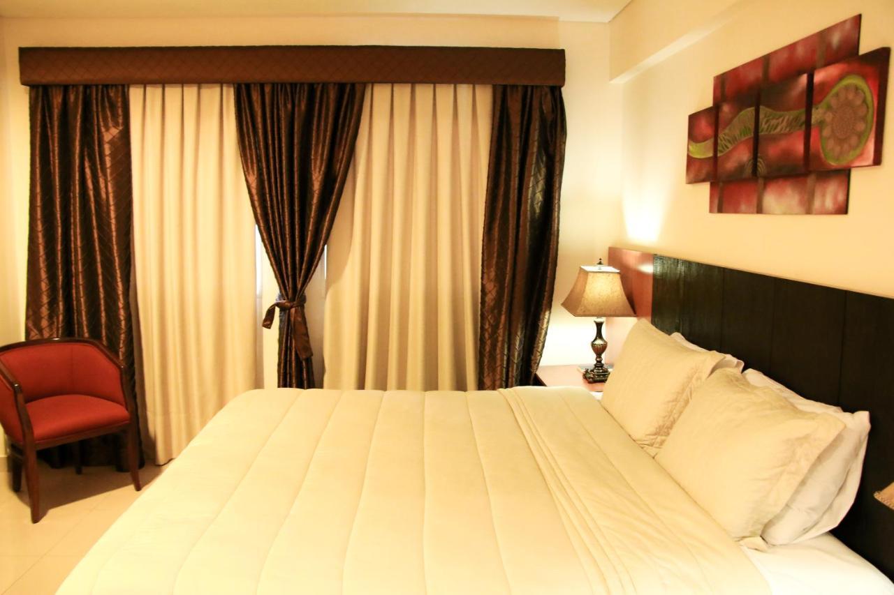 Olimpo Hotel & Suites Itauguá Buitenkant foto