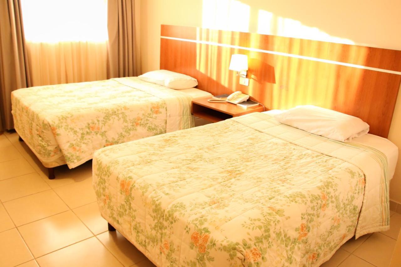 Olimpo Hotel & Suites Itauguá Buitenkant foto