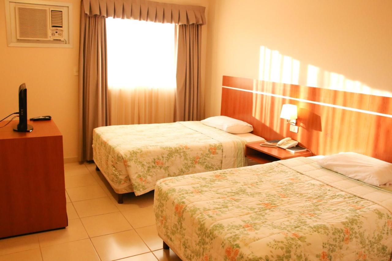 Olimpo Hotel & Suites Itauguá Buitenkant foto
